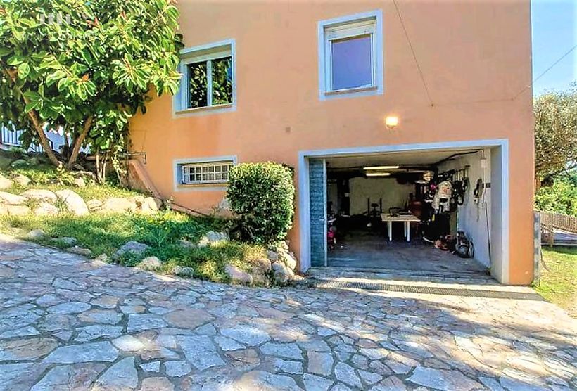Maison de 412 m2 avec 7 chambres, garage et terrain de 1324 m2 avec vue mer